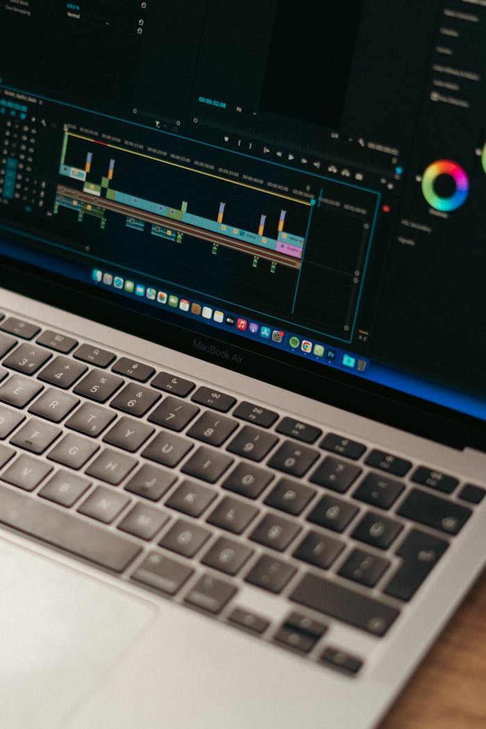 services-02 Detailed view of video editing software interface on a MacBook Air.